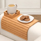 Enhanced Product Title: "Umweltfreundlicher Bambus Armlehnen Tablett – Praktischer Becher- und Snackhalter für das Sofa" 

This title maintains the original meaning while improving clarity and appeal for Google Shopping.