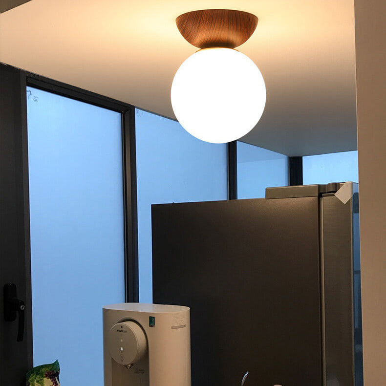 Optimized Product Title: "Moderne Glaskugel Deckenleuchte – Elegante Deckenlampe für Wohnräume, Schlafzimmer & Flure" 

This title includes relevant keywords while providing more detail about the product's style and potential uses, which can improve visib