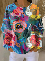 Enhanced Product Title: "Ida Pullover mit Großem Buntem Blumenmuster – Stylischer Damenpullover für einen Frischen Look" 

This title includes relevant keywords while providing a clear description of the product, making it more appealing for Google Shoppi