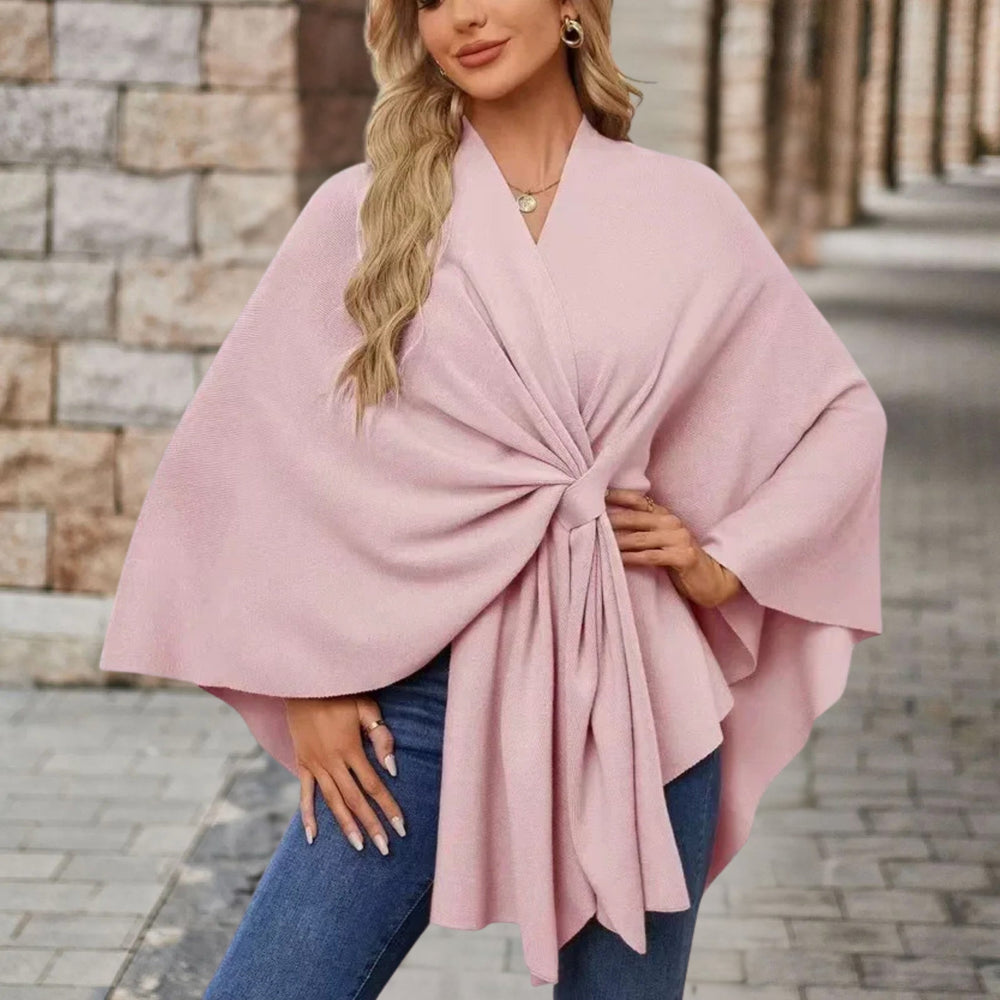 Enhanced Product Title: "Lia™ Stylish Schicker Poncho - Trendy Women's Outerwear for All Seasons" 

This title includes keywords that potential customers might search for, such as "stylish," "trendy," and "women's outerwear," while still highlighting the