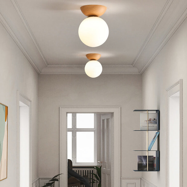 Optimized Product Title: "Moderne Glaskugel Deckenleuchte – Elegante Deckenlampe für Wohnräume, Schlafzimmer & Flure" 

This title includes relevant keywords while providing more detail about the product's style and potential uses, which can improve visib