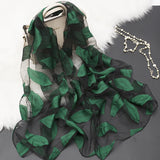 BowLift | Silk scarf with cut flowers hollow motif