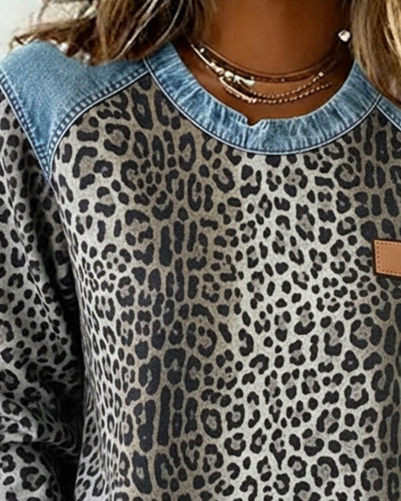 Optimized Product Title: "Leopard Print Denim Patchwork Pullover for Women - Stylish Casual Sweater" 

This title includes relevant keywords for better visibility while providing a clear description of the product.