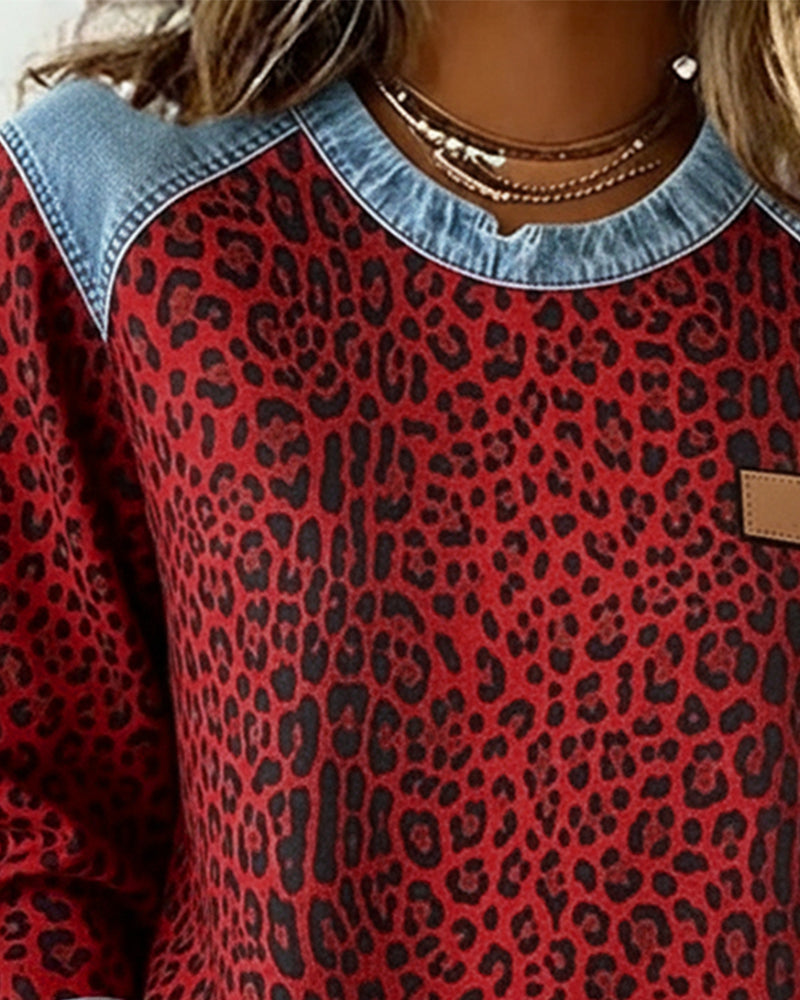 Optimized Product Title: "Leopard Print Denim Patchwork Pullover for Women - Stylish Casual Sweater" 

This title includes relevant keywords for better visibility while providing a clear description of the product.