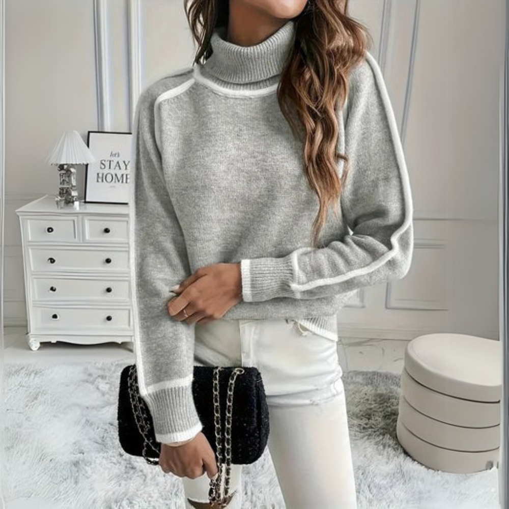 Optimized Product Title: "Aurora Relaxed Fit Rollkragenpullover für Damen - Bequemer, Stilvoller Pullover für Herbst/Winter" 

This title includes relevant keywords while providing additional details about the product, such as the target audience and seas