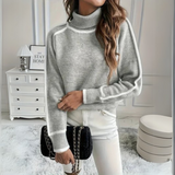 Optimized Product Title: "Aurora Relaxed Fit Rollkragenpullover für Damen - Bequemer, Stilvoller Pullover für Herbst/Winter" 

This title includes relevant keywords while providing additional details about the product, such as the target audience and seas