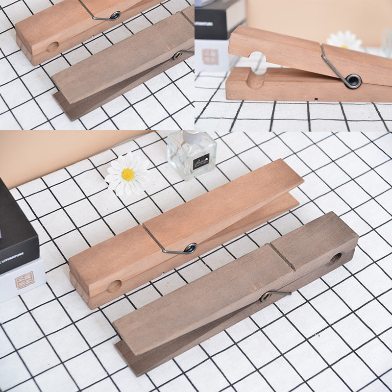 Optimized Product Title: "Holz Handtuchhalter mit Klammer – Stilvoller und Funktionaler Handtuchhalter aus Holz für Küche und Bad" 

This title includes relevant keywords while providing a clearer description of the product's use and appeal.