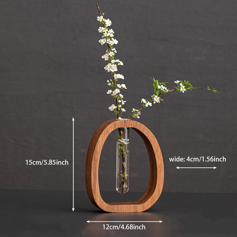 Enhanced Product Title: "Wandvase aus Holz mit Glasröhrchen – Stilvolle Pflanzenzucht und Dekoration für Ihr Zuhause" 

This title includes relevant keywords while emphasizing the product's aesthetic appeal and functionality.