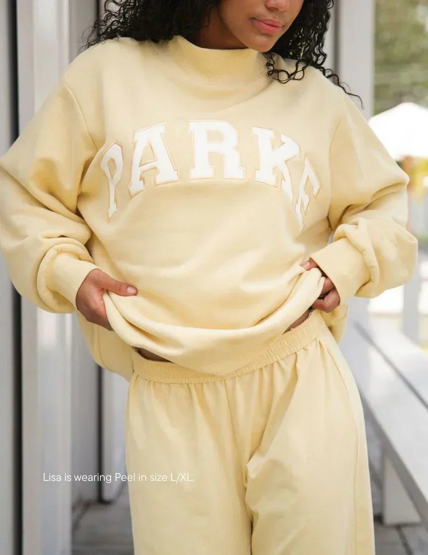 Pastel Yellow Varsity Mockneck Sweatshirt with Navy Letters - Stylish & Comfortable Unisex Apparel