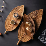 Enhanced Product Title: "Holz-Blatt Serviertablett mit Griff – Dekoratives und Funktionales Tablett für Küche und Wohnzimmer" 

This title includes relevant keywords for better visibility while maintaining clarity and appeal.