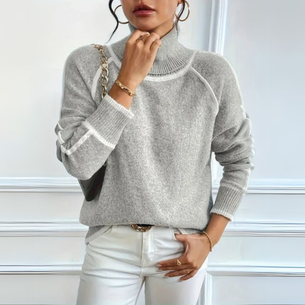 Optimized Product Title: "Aurora Relaxed Fit Rollkragenpullover für Damen - Bequemer, Stilvoller Pullover für Herbst/Winter" 

This title includes relevant keywords while providing additional details about the product, such as the target audience and seas