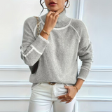 Optimized Product Title: "Aurora Relaxed Fit Rollkragenpullover für Damen - Bequemer, Stilvoller Pullover für Herbst/Winter" 

This title includes relevant keywords while providing additional details about the product, such as the target audience and seas