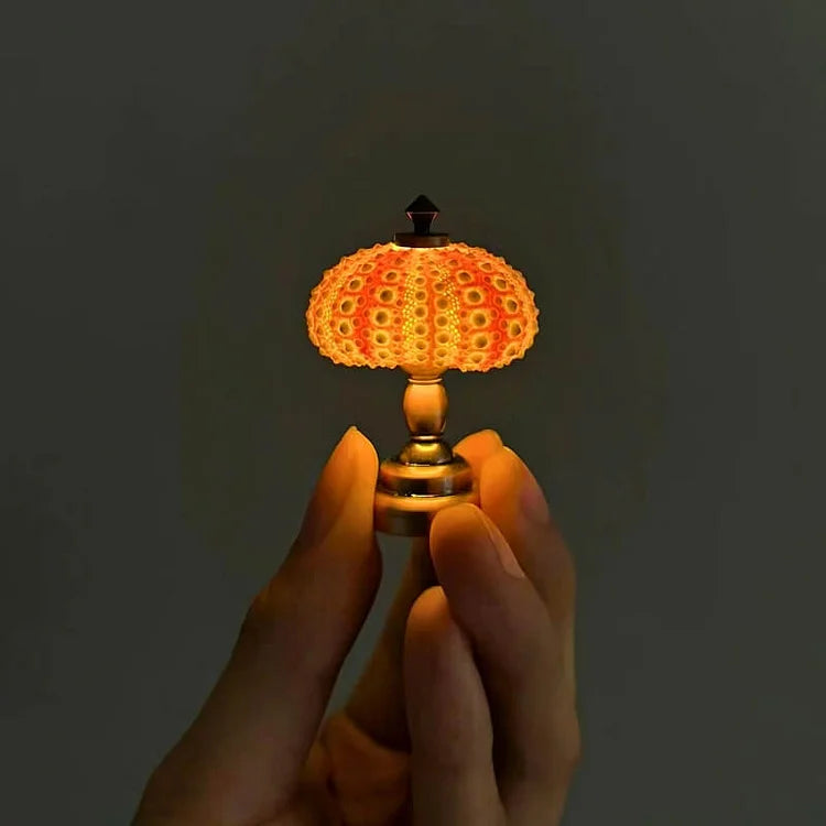 Enhanced Product Title: "Seeigel Nachtlampe - Elegante LED Kinder-Nachtlicht mit sanfter Beleuchtung für beruhigende Nächte" 

This title includes relevant keywords and provides more detail about the product, which can help improve visibility and attract
