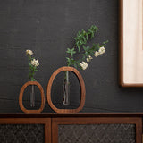 Enhanced Product Title: "Wandvase aus Holz mit Glasröhrchen – Stilvolle Pflanzenzucht und Dekoration für Ihr Zuhause" 

This title includes relevant keywords while emphasizing the product's aesthetic appeal and functionality.