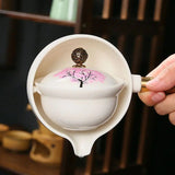 Cherry Blossom Ceramic Teapot – Color-Changing, Rotating Steel Strainer & Wood Handle