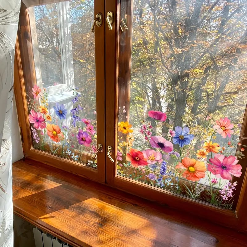 Optimized Product Title: "Blumen- und Schmetterling Fensteraufkleber – Dekorative Wandtattoos für Fenster und Wände" 

This title includes relevant keywords while also providing a clear description of the product's purpose and appeal.