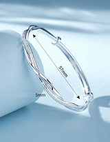 Elegant Twisted Silver Bracelet Bowlift