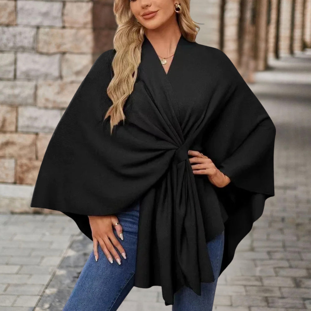 Enhanced Product Title: "Lia™ Stylish Schicker Poncho - Trendy Women's Outerwear for All Seasons" 

This title includes keywords that potential customers might search for, such as "stylish," "trendy," and "women's outerwear," while still highlighting the