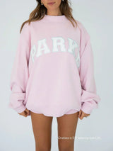 Soft Pink Varsity Mockneck Sweatshirt with White Lettering - Trendy Casual Wear