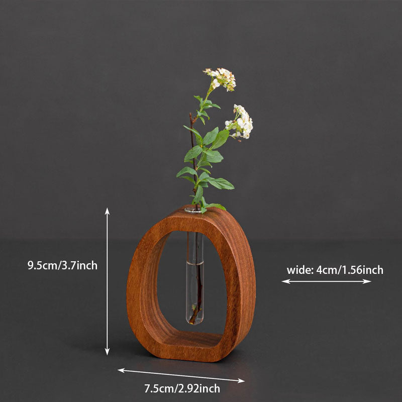 Enhanced Product Title: "Wandvase aus Holz mit Glasröhrchen – Stilvolle Pflanzenzucht und Dekoration für Ihr Zuhause" 

This title includes relevant keywords while emphasizing the product's aesthetic appeal and functionality.