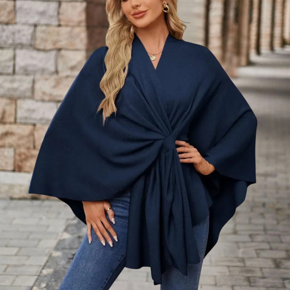 Enhanced Product Title: "Lia™ Stylish Schicker Poncho - Trendy Women's Outerwear for All Seasons" 

This title includes keywords that potential customers might search for, such as "stylish," "trendy," and "women's outerwear," while still highlighting the