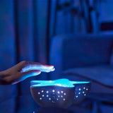 Ocean Wave Star Projector – 7 Colors, Adjustable Brightness & 1200mAh Rechargeable