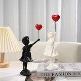 Kalsten | Banksy flying Balloon Girl Statue