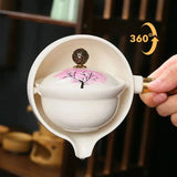 Cherry Blossom Ceramic Teapot – Color-Changing, Rotating Steel Strainer & Wood Handle
