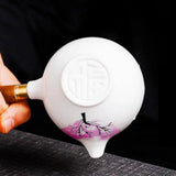 Cherry Blossom Ceramic Teapot – Color-Changing, Rotating Steel Strainer & Wood Handle