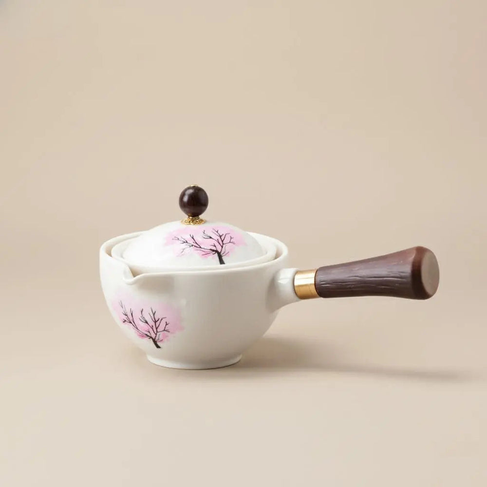 Cherry Blossom Ceramic Teapot – Color-Changing, Rotating Steel Strainer & Wood Handle