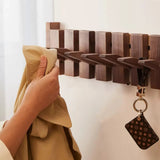 Designer Garderobe im Klavierstil – 8 klappbare Haken für stilvolle Flure – Platzsparende Wandgarderobe