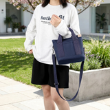 Optimized Product Title: "Japanisch Inspirierte Canvas-Tragetasche – Leicht, Langlebig & Mit Praktischen Innenfächern für Alltag & Reisen" 

This title includes relevant keywords while maintaining clarity and appeal for potential buyers.