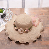 Optimized Product Title: "Damen Sommerhut mit Blütendekoration – Stylischer UV-Schutz für Strand und Garten" 

This title includes relevant keywords while emphasizing the product's features and benefits, making it more appealing for Google Shopping.