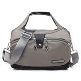 Damen Handtasche mit Schultergurt und mehreren Fächern