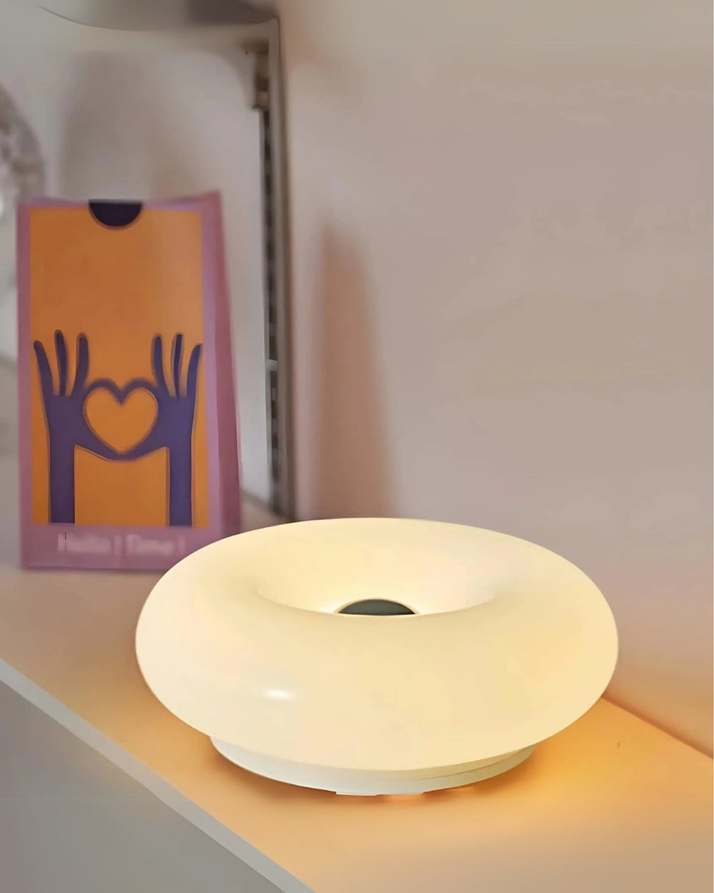 Enhanced Product Title: "Donut-Form Runde Tischlampe mit Sanftem LED-Licht – Stilvolle Beleuchtung für Ihr Zuhause" 

This title includes relevant keywords while maintaining clarity and appeal for potential customers.