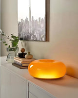 Enhanced Product Title: "Donut-Form Runde Tischlampe mit Sanftem LED-Licht – Stilvolle Beleuchtung für Ihr Zuhause" 

This title includes relevant keywords while maintaining clarity and appeal for potential customers.