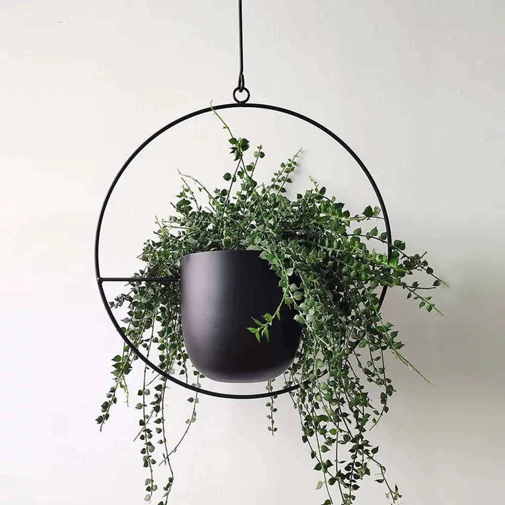 Optimized Product Title: "Moderner Hängeblumentopf aus hochwertigem Material – Stilvoller Pflanzenbehälter für Innen- und Außenbereich" 

This title includes relevant keywords and highlights the product's features, making it more appealing for Google Shop
