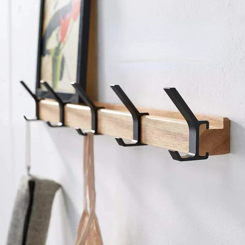 Enhanced Product Title: "Wandgarderobe aus Holz und Metall mit 5 Doppelhaken – Stilvolle Aufbewahrungslösung für Flur und Eingangsbereich" 

This title includes relevant keywords while providing additional context to attract potential buyers.