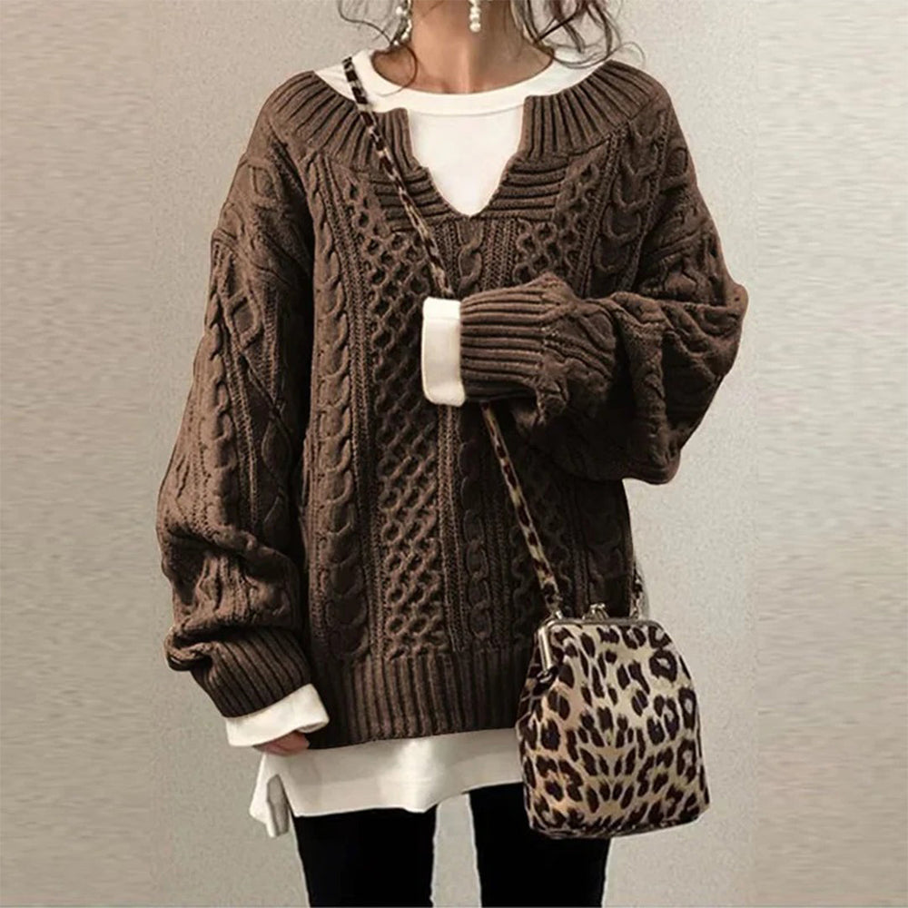 Optimized Product Title: "Überdimensionierter Strickpullover mit Zopfmuster – Gemütlicher, Oversized Pullover für Damen | Trendige Wintermode" 

This title includes relevant keywords and phrases that can help improve visibility in Google Shopping searches