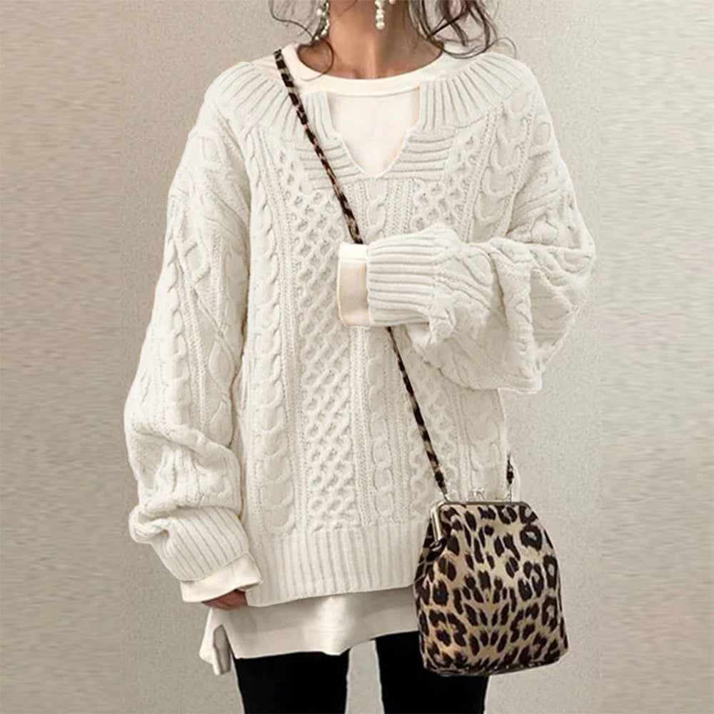 Optimized Product Title: "Überdimensionierter Strickpullover mit Zopfmuster – Gemütlicher, Oversized Pullover für Damen | Trendige Wintermode" 

This title includes relevant keywords and phrases that can help improve visibility in Google Shopping searches