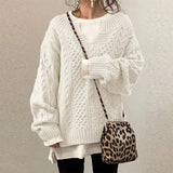Optimized Product Title: "Überdimensionierter Strickpullover mit Zopfmuster – Gemütlicher, Oversized Pullover für Damen | Trendige Wintermode" 

This title includes relevant keywords and phrases that can help improve visibility in Google Shopping searches