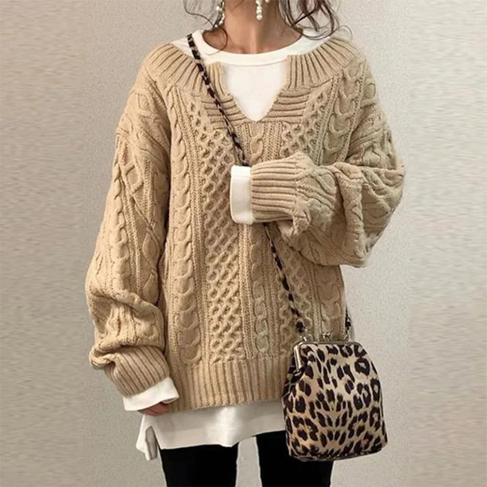 Optimized Product Title: "Überdimensionierter Strickpullover mit Zopfmuster – Gemütlicher, Oversized Pullover für Damen | Trendige Wintermode" 

This title includes relevant keywords and phrases that can help improve visibility in Google Shopping searches