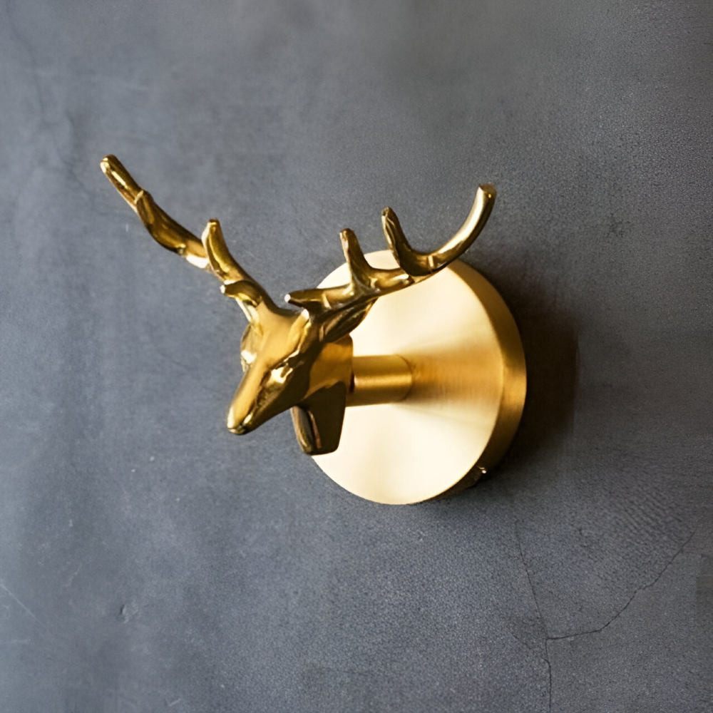 Enhanced Product Title: "Elegante Tier-Wandhaken mit Goldfinish – Stilvolle Aufbewahrungslösung für Ihr Zuhause" 

This title includes keywords that may improve search visibility and provides a clearer description of the product's purpose and appeal.
