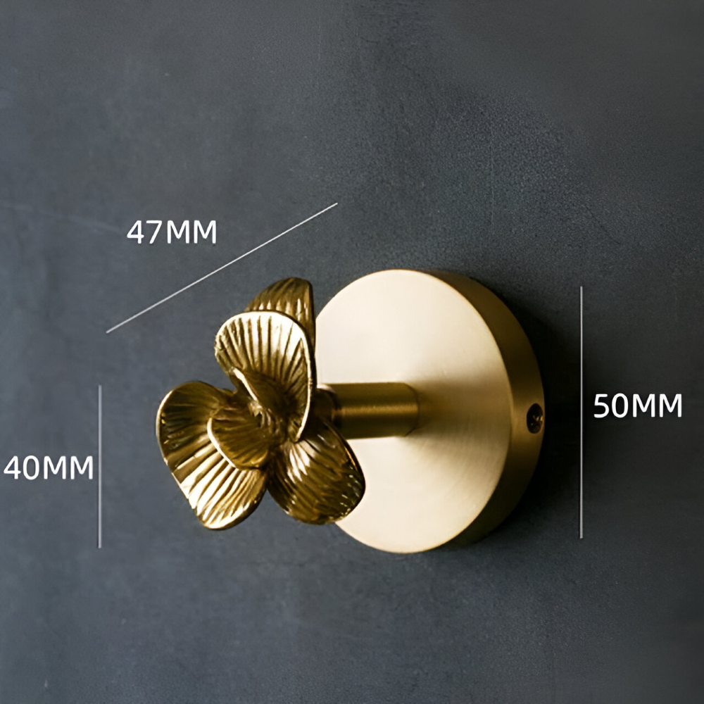 Enhanced Product Title: "Elegante Tier-Wandhaken mit Goldfinish – Stilvolle Aufbewahrungslösung für Ihr Zuhause" 

This title includes keywords that may improve search visibility and provides a clearer description of the product's purpose and appeal.
