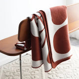 Enhanced Product Title: "Luxurious Jacquard Throw Blanket - Soft, Cozy, and Stylish Home Decor" 

This title includes keywords that potential customers might search for, while also highlighting the product's features and benefits.