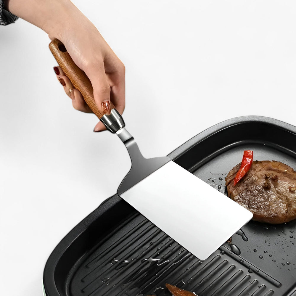 Optimized Product Title: "Quadratischer Grill- und Pfannenwender mit Holzgriff – Präzise Wendehilfe für perfekten Grillgenuss" 

This title includes relevant keywords while enhancing clarity and appeal for potential buyers.