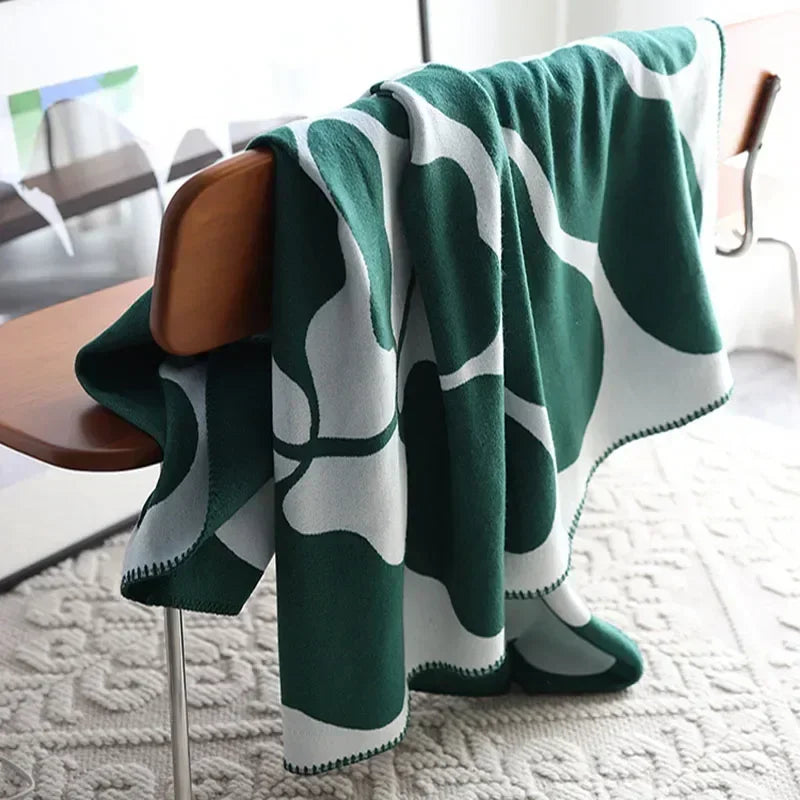 Enhanced Product Title: "Luxurious Jacquard Throw Blanket - Soft, Cozy, and Stylish Home Decor" 

This title includes keywords that potential customers might search for, while also highlighting the product's features and benefits.