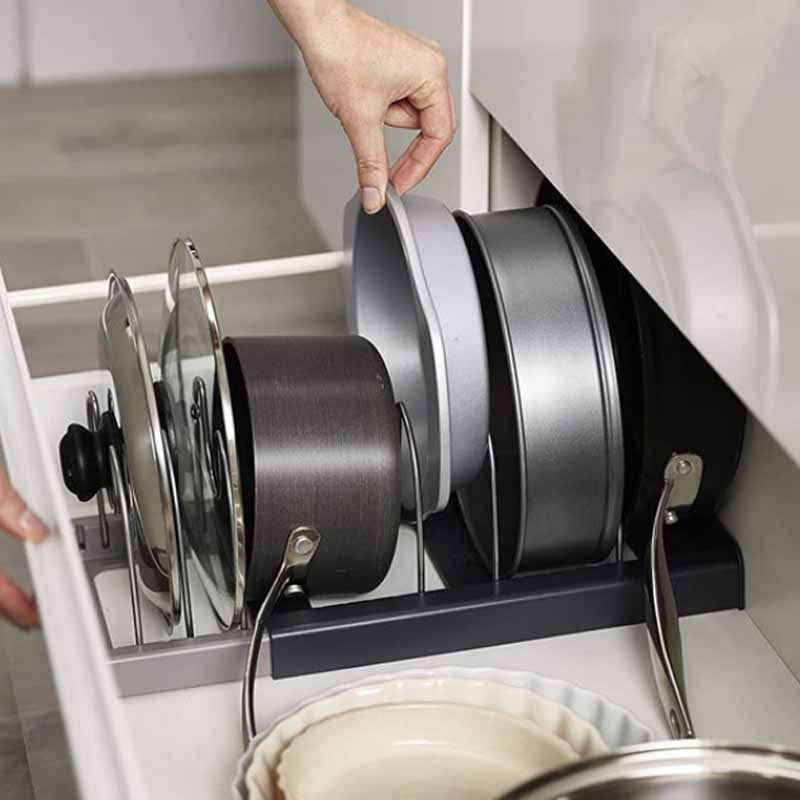 Optimized Product Title: **Verstellbarer Pfannen- und Deckelhalter – Platzsparend für Schubladen & Schränke – Ideal für die Küche** 

This title includes relevant keywords while emphasizing the product's features and benefits, making it more appealing for