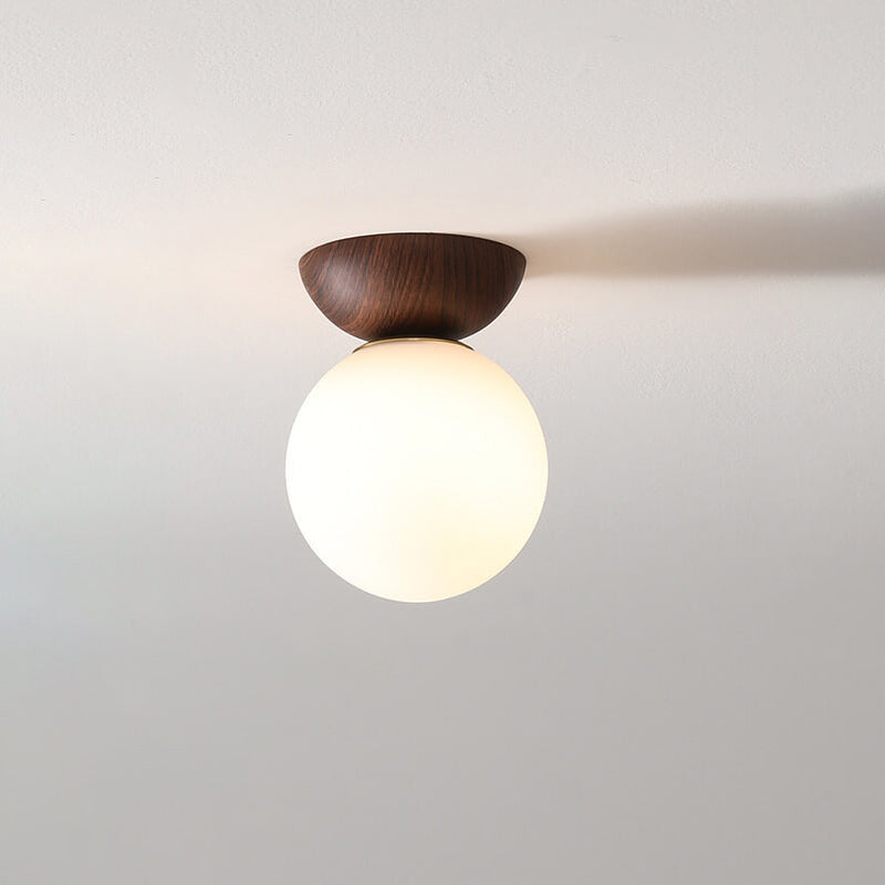Optimized Product Title: "Moderne Glaskugel Deckenleuchte – Elegante Deckenlampe für Wohnräume, Schlafzimmer & Flure" 

This title includes relevant keywords while providing more detail about the product's style and potential uses, which can improve visib