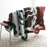 Enhanced Product Title: "Luxurious Jacquard Throw Blanket - Soft, Cozy, and Stylish Home Decor" 

This title includes keywords that potential customers might search for, while also highlighting the product's features and benefits.